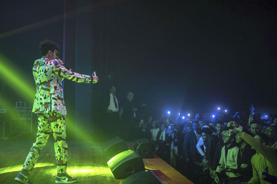 In this Friday, Nov. 22, 2019 photo, Moroccan rapper Abdelkrim Bouhjir, known as Kouz1, performs at a rap concert as part of the Visa for Music festival in Rabat, Morocco. (AP Photo/Mosa'ab Elshamy)