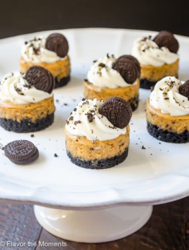 <p>Flavor the Moments</p><p>These tiny cheesecakes are lightened up pumpkin cheesecakes with an Oreo cookie crust. Top them with whipped cream and crushed Oreos for the perfect fall treat!</p><p><strong>Get the recipe: <a href="https://flavorthemoments.com/mini-cookies-n-cream-pumpkin-cheesecakes/" rel="nofollow noopener" target="_blank" data-ylk="slk:Mini Cookies 'N Cream Pumpkin Cheesecakes;elm:context_link;itc:0;sec:content-canvas" class="link ">Mini Cookies 'N Cream Pumpkin Cheesecakes</a></strong></p>