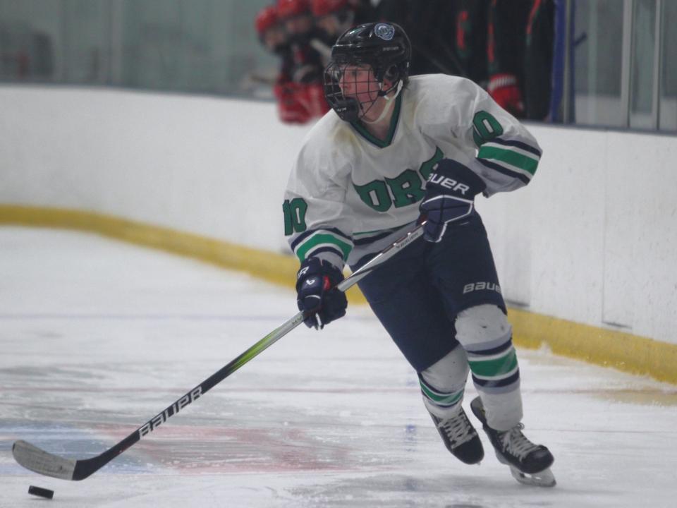 Dighton-Rehoboth/Seekonk's Adam Bastis controls the puck during an MIAA-RIIL crossover game against Nariho.