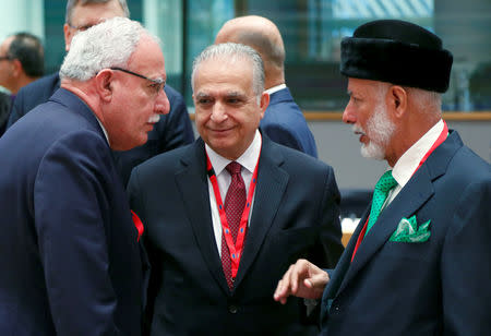 Palestinian Foreign Minister Riyad al-Maliki, Iraqi Foreign Minister Mohammed al-Hakim and Oman's Minister of Foreign Affairs Yusuf bin Alawi bin Abdullah attend a joint meeting of European Union and League of Arab States foreign ministers in Brussels, Belgium February 4, 2019. REUTERS/Francois Lenoir