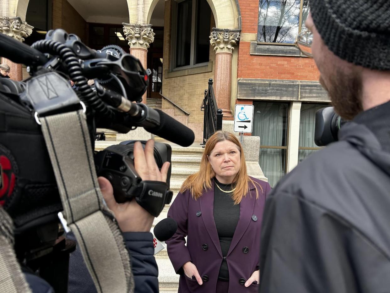 Sheree Conlon, the lawyer representing the Canadian Civil Liberties Association, speaks to reporters outside the Fredericton courthouse on Thursday. (Hadeel Ibrahim/CBC - image credit)