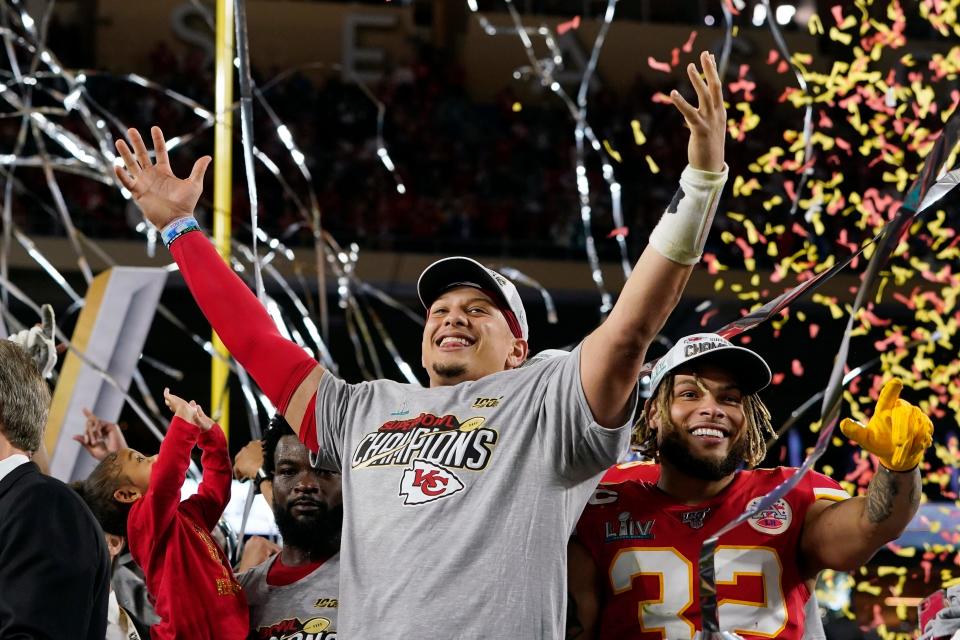 FILE - In this Feb. 2, 2020, file photo, Kansas City Chiefs' Patrick Mahomes, left, and Tyrann Mathieu celebrate after defeating the San Francisco 49ers in the NFL Super Bowl 54 football game in Miami Gardens, Fla.