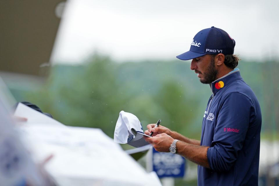 May 14, 2024; Louisville, Kentucky, USA; Max Homa signs autographs during a practice round for the PGA Championship golf tournament at Valhalla Golf Club. Mandatory Credit: Aaron Doster-USA TODAY Sports