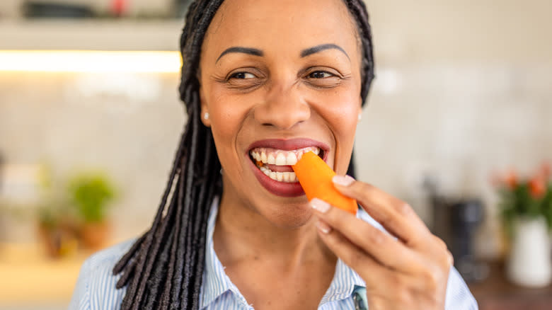 woman eating standing up