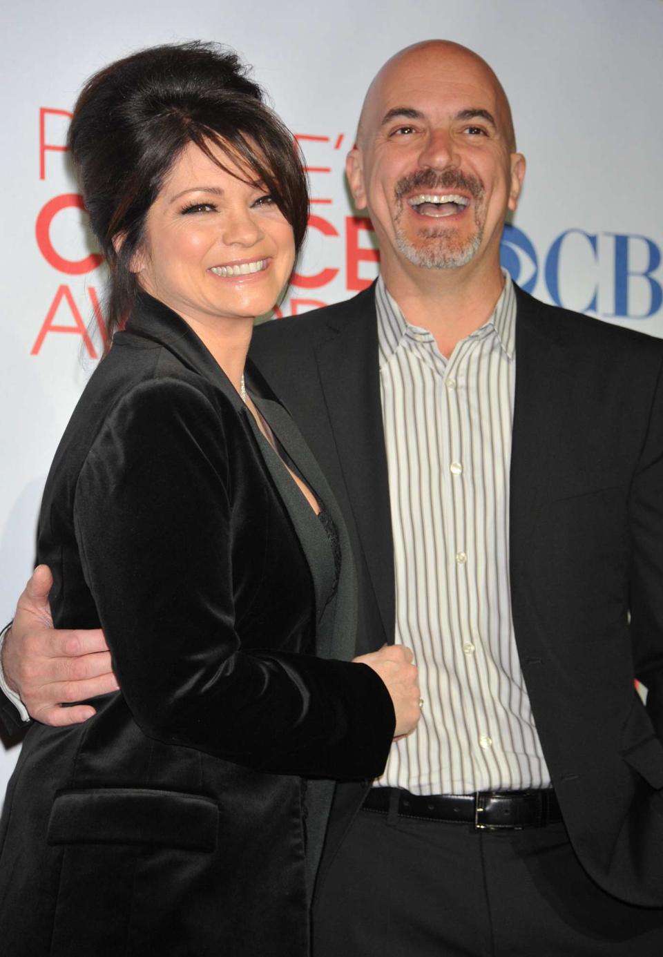 Valerie Bertinelli and husband Tom Vitale pose in the press room at the People's Choice Awards 2012 held at Nokia Theater L.A. Live in Los Angeles