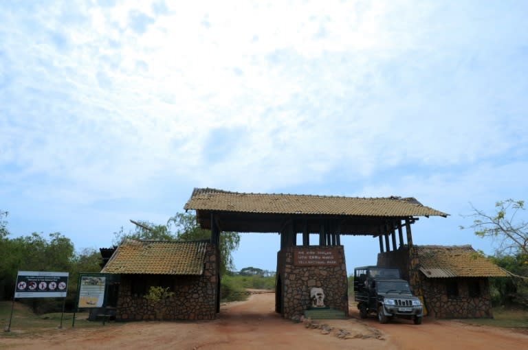 A jeep passes through the entrance to Yala National Park in the southern Sri Lankan district of Yala, some 250kms southeast of Colombo, on August 16, 2015