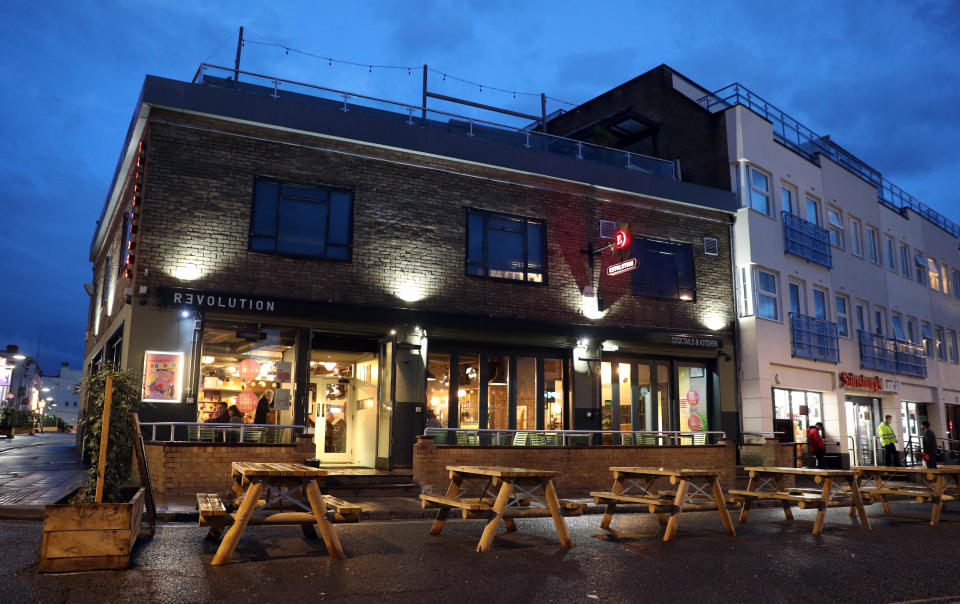 Empty tables on pedestrianised street outside bar Revolution on Bedford Place in Southampton. All pubs, bars, restaurants in England must have a 10pm closing time from Thursday, to help curb the spread of coronavirus.