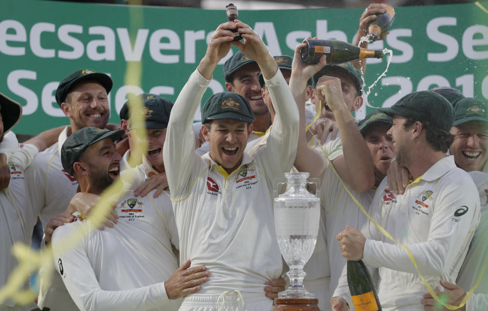 Australian captain Tim Paine (pictured middle) lifts the Ashes urn at The Oval on September 15th, 2019 in London.