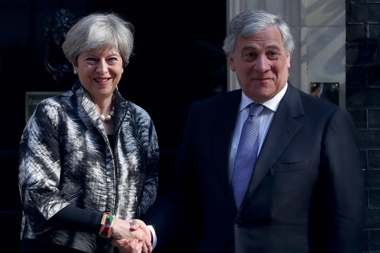 Prime Minister Theresa May greets the President of the European Parliament Antonio Tajani: PA