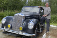 This undated photo shows Wally Carlo posing with a 1951 Mercedes that his brother, Stewy, bought while he was serving in the Army during the Vietnam War. Stewy Carlo died in a car accident in 1975, but his brother will apply for an allotment of 160 acres of government-owned land in Alaska under a new program that will allow Alaska Native Vietnam veterans or their heirs to apply for land that they might have missed out on in earlier programs because of their service. (Photo by Seeyaa Charpentier via AP)