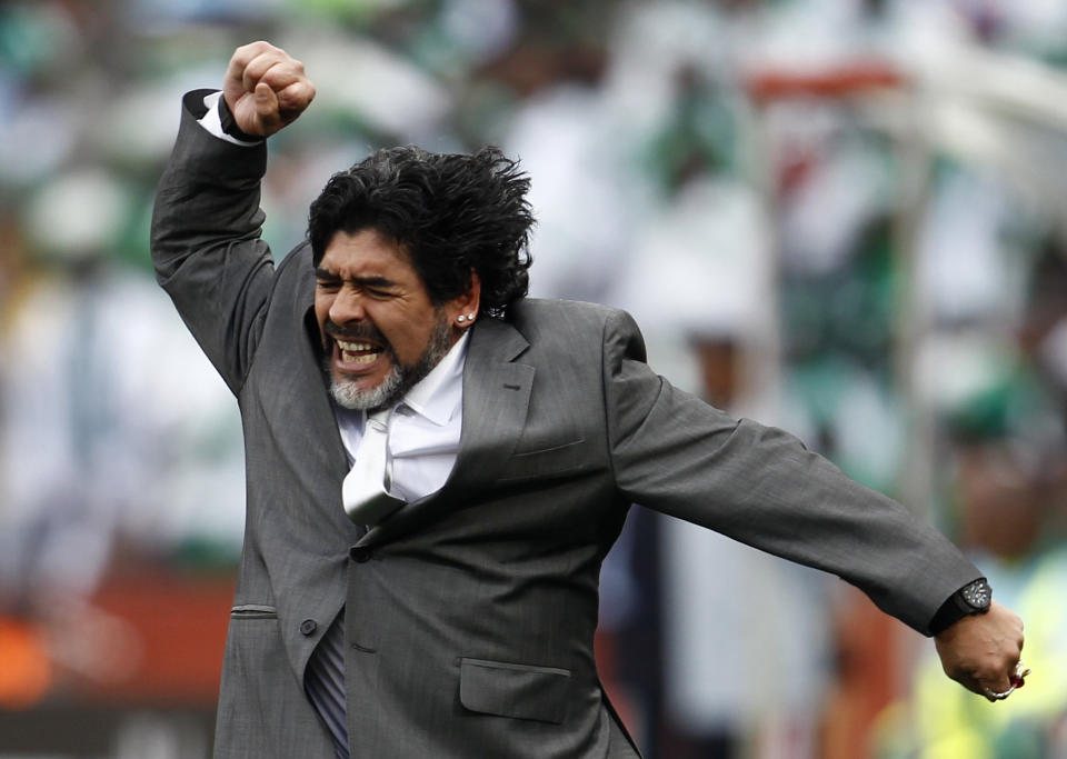 Argentina's coach Diego Maradona celebrates his team's goal against Nigeria during the 2010 World Cup Group B soccer match at Ellis Park stadium in Johannesburg June 12, 2010.   REUTERS/Eddie Keogh (SOUTH AFRICA  - Tags: SPORT SOCCER WORLD CUP IMAGE OF THE DAY TOP PICTURE)   FOR BEST QUALITY AVAILABLE: ALSO SEE GM1E73T01CG01