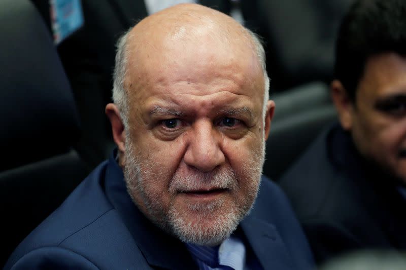 Iran's Oil Minister Bijan Zanganeh talks to journalists at the beginning of an OPEC meeting in Vienna