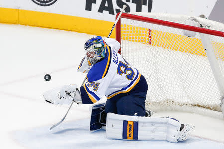 Apr 3, 2016; Denver, CO, USA; St. Louis Blues goalie Jake Allen (34) makes a save in the first period against the Colorado Avalanche at the Pepsi Center. Mandatory Credit: Isaiah J. Downing-USA TODAY Sports / Reuters Picture Supplied by Action Images