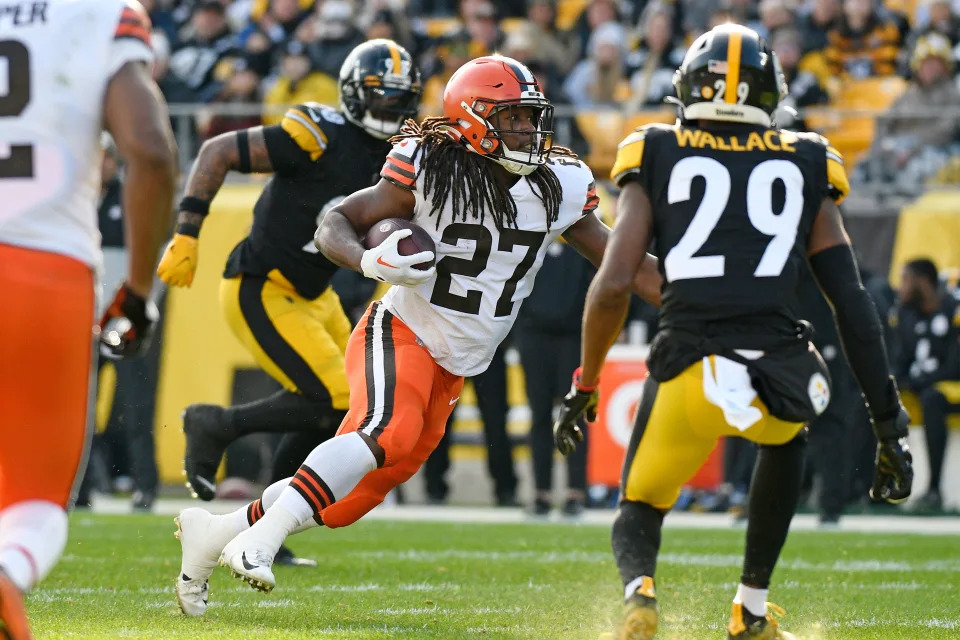Cleveland Browns running back Kareem Hunt (27) carries the ball during the first half of an NFL football game against the Pittsburgh Steelers in Pittsburgh, Sunday, Jan. 8, 2023. (AP Photo/Don Wright)
