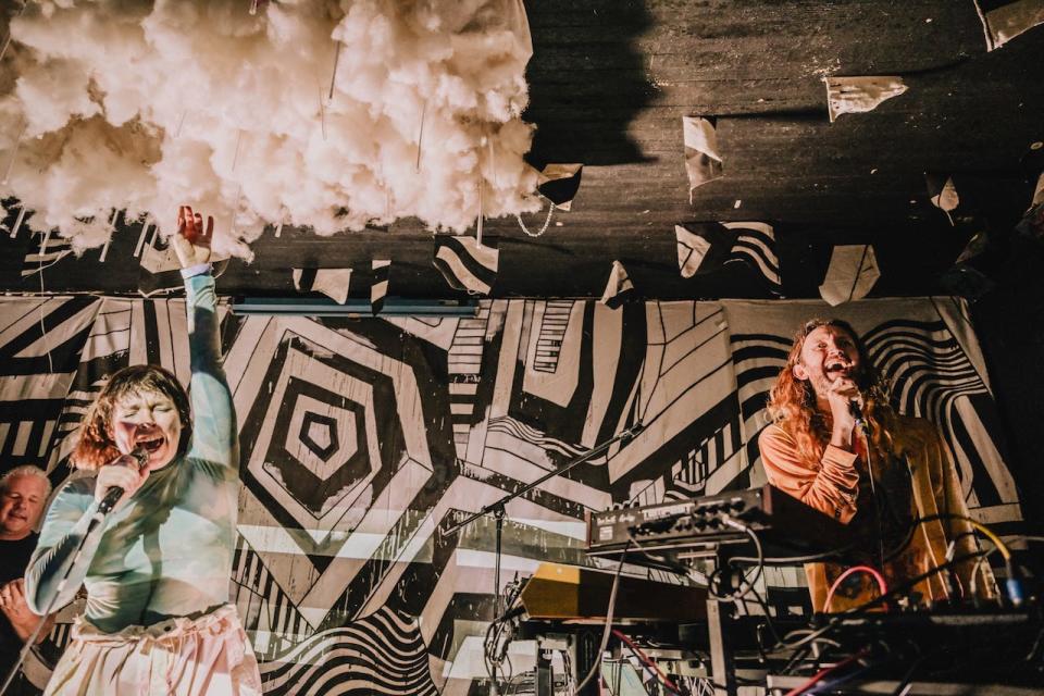 Sylvan Esso plays a surprise show at the Cactus Club on Tuesday, Sept. 13, 2022. The married members of the synthpop duo, Amelia Meath and Nick Sanborn, met at the club in 2010. Also pictured in the far left is special guest Chris Rosenau of Milwaukee band Collections of Colonies of Bees.