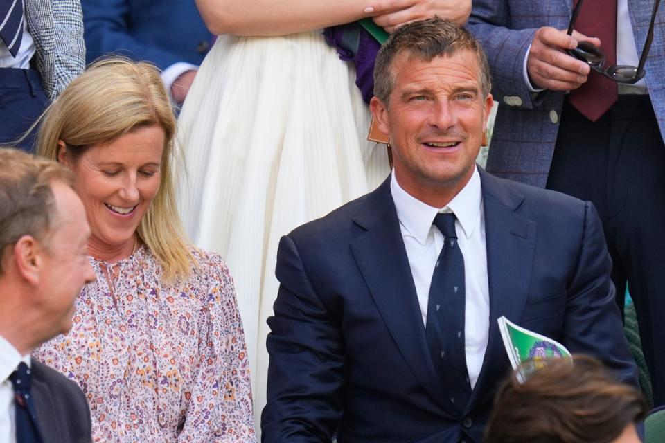 Bear Grylls and his wife Shara on Centre Court for the second round match between Serbia's Novak Djokovic and Britain's Jacob Fearnley (AP)