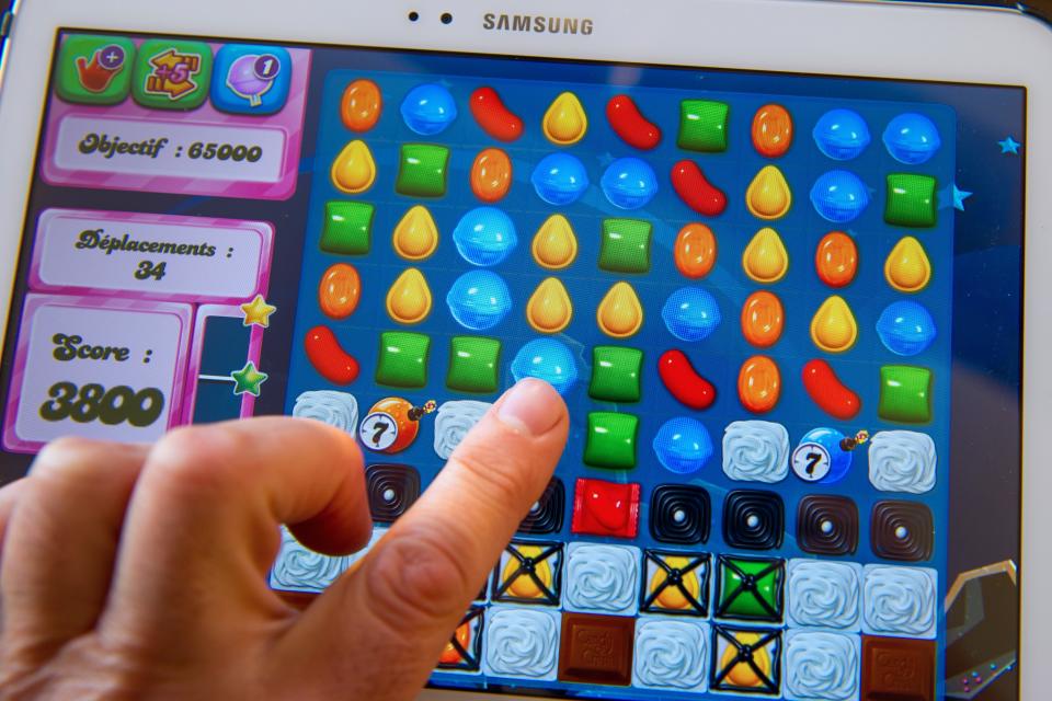 Candy Crush involves lining up tiny pieces of coloured sweets to make them vanish from the screen