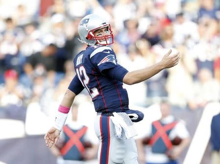 Oct 16, 2016; Foxborough, MA, USA; New England Patriots quarterback Tom Brady (12) reacts after a touchdown during the fourth quarter against the Cincinnati Bengals at Gillette Stadium. The New England Patriots won 35-17. Mandatory Credit: Greg M. Cooper-USA TODAY Sports