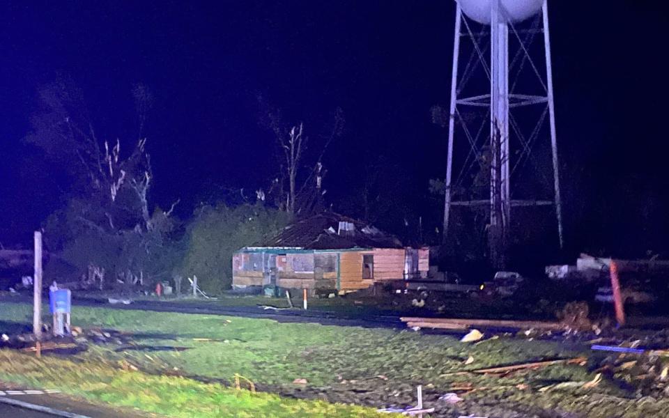 Destruction and emergency services at the scene after tornadoes tore through the US state of Mississippi - MISSISSIPPI HIGHWAY PATROL HANDOUT/EPA-EFE/Shutterstock