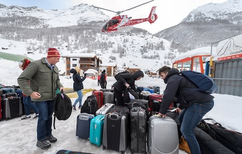 leaving Zermatt Switzerland by helicopter - Credit: Getty Images