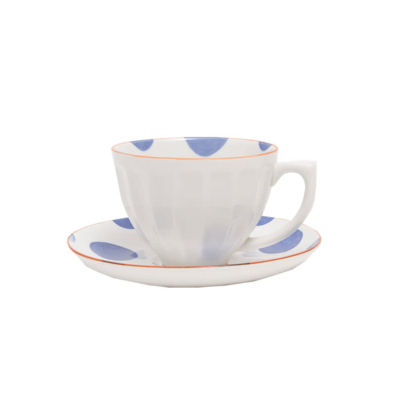 <a rel="nofollow noopener" href="https://www.zarahome.com/us/tableware/dessert-sets/polka-dots-porcelain-teacup-and-saucer-c1020072617p300033435.html" target="_blank" data-ylk="slk:Polka Dots Porcelain Teacup and Saucer, Zara Home, $8;elm:context_link;itc:0;sec:content-canvas" class="link ">Polka Dots Porcelain Teacup and Saucer, Zara Home, $8</a>