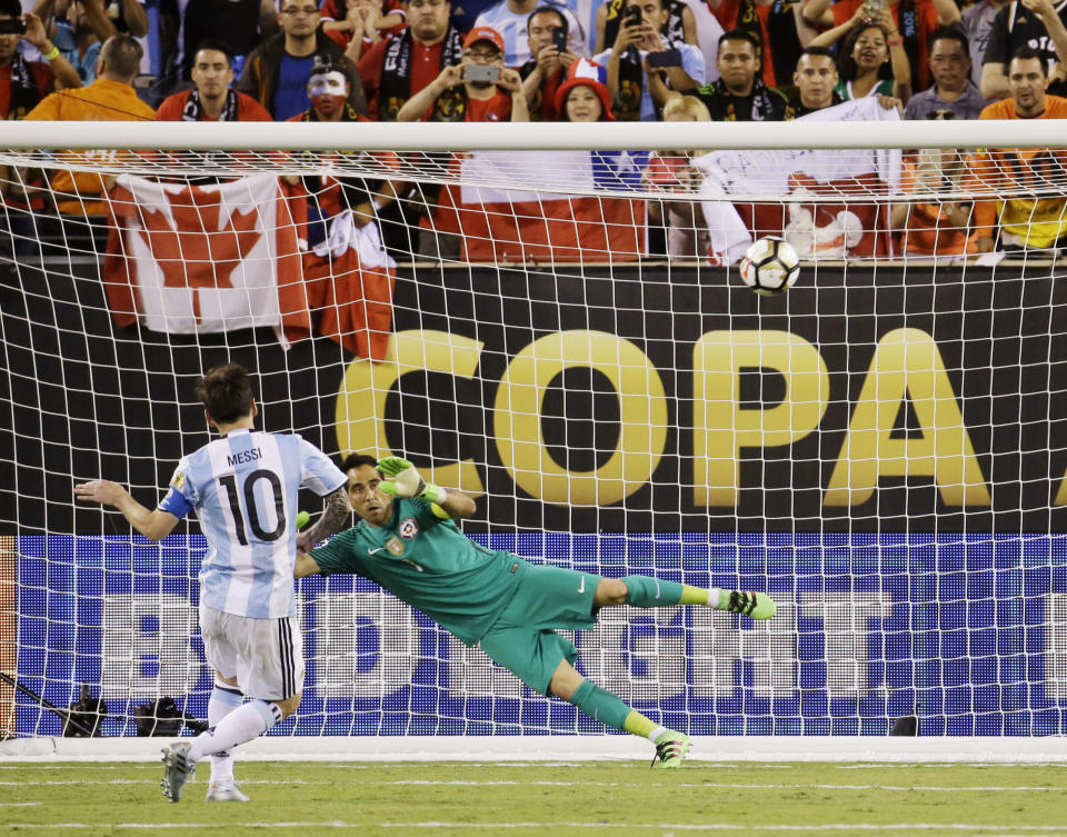 FILE - Argentina's Lionel Messi misses his shot during penalty kicks in the Copa America Centenario championship soccer match, Sunday, June 26, 2016, in East Rutherford, N.J. Chile defeated Argentina 4-2- in penalty kicks. The penalty shootout is a tense battle of wills over 12 yards (11 meters) that has increasingly become a huge part of soccer and an unavoidable feature of the knockout stage in the biggest competitions. (AP Photo/Julio Cortez, File)