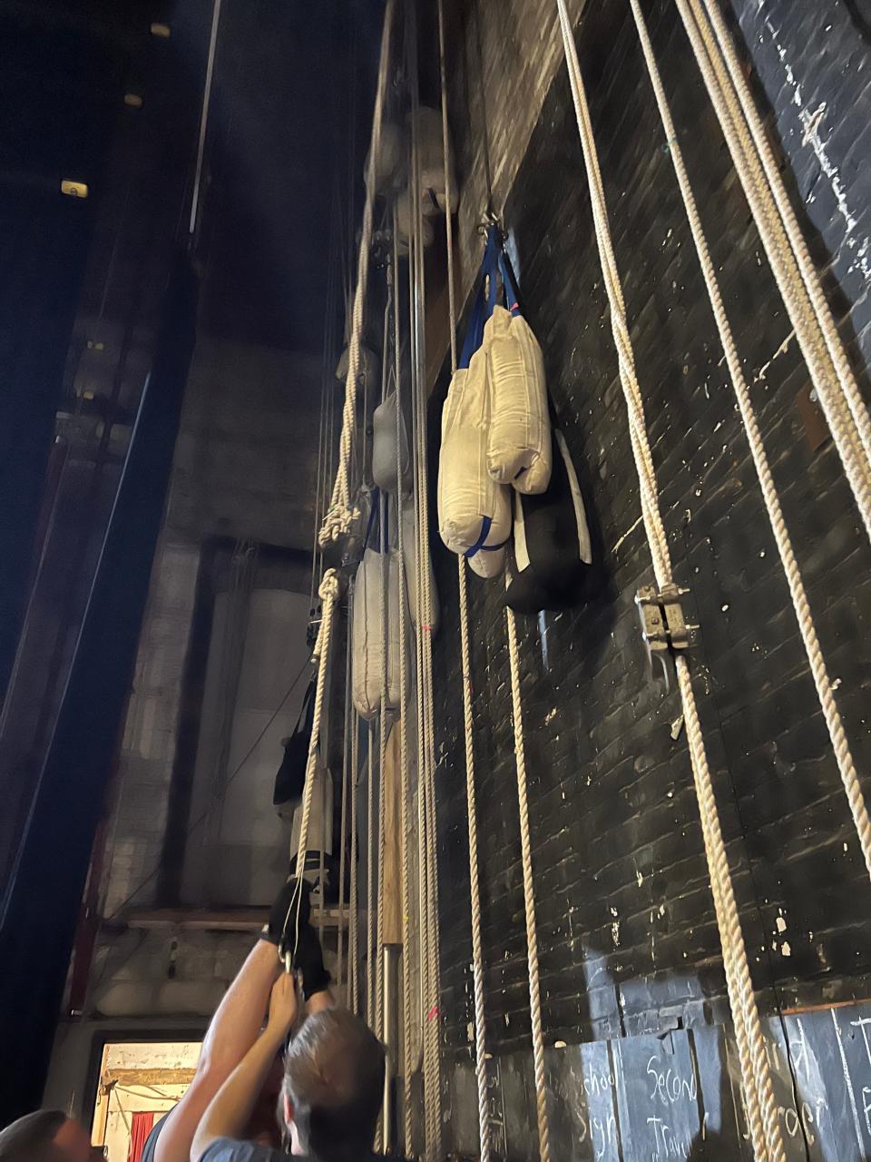 Sandbags hang in the 40-foot tall fly space at Muncie Civic Theatre downtown as the crew begins to work on dismantling the rigging system that has been in place more than 100 years.
(Photo: Angelus Kocoshis/Muncie Civic Theatre)