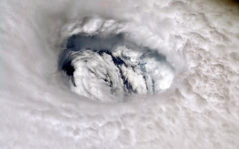 A handout photo made available by NASA shows an image of Hurricane Dorian's eye taken by NASA astronaut Nick Hague - Credit: NASA HANDOUT/EPA-EFE/REX