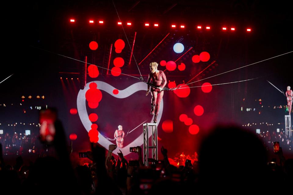 During her show, P!nk took to the air for the set-closing hit "So What."