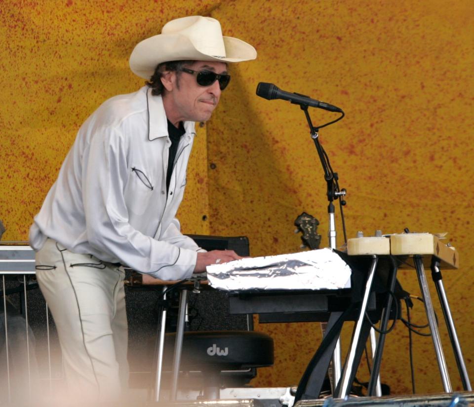 Bob Dylan performs at the New Orleans Jazz and Heritage Festival on April 28, 2006.