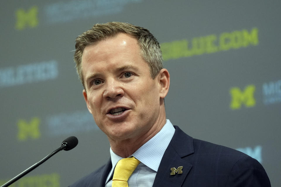 Dusty May is introduced as the Universtiy of Michigan NCAA college basketball head coach, Tuesday, March 26, 2024, in Ann Arbor, Mich. (AP Photo/Carlos Osorio)