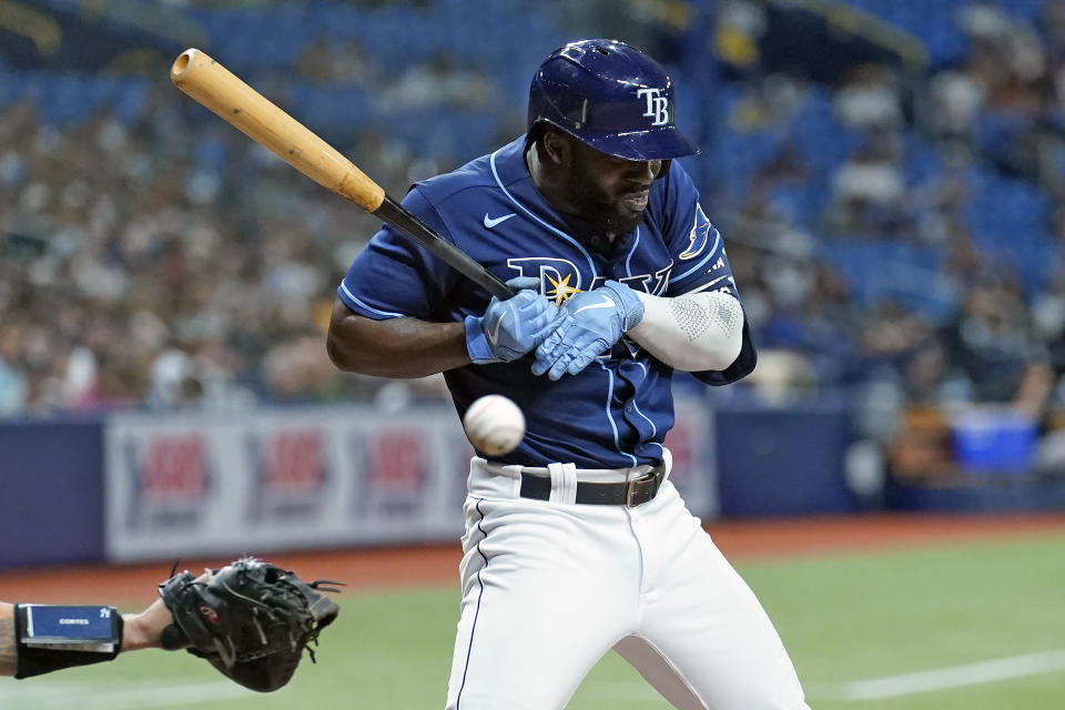 Tampa Bay Rays' Randy Arozarena gets hit by a pitch from New York Yankees' Nestor Cortes during the fourth inning of a baseball game Wednesday, July 28, 2021, in St. Petersburg, Fla. (AP Photo/Chris O'Meara)