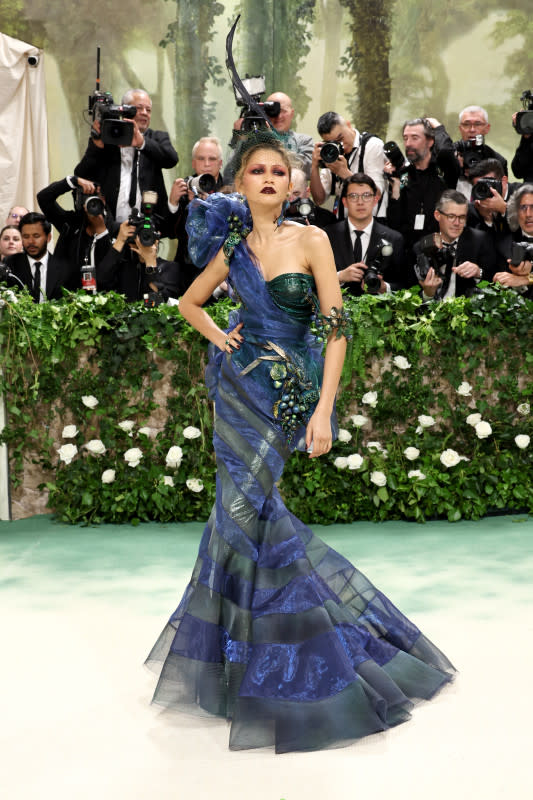 <p>Jamie McCarthy/Getty Images</p><p>It girl Zendaya never disappoints on a red carpet and this blue/green number with botanical accents was no exception. </p>