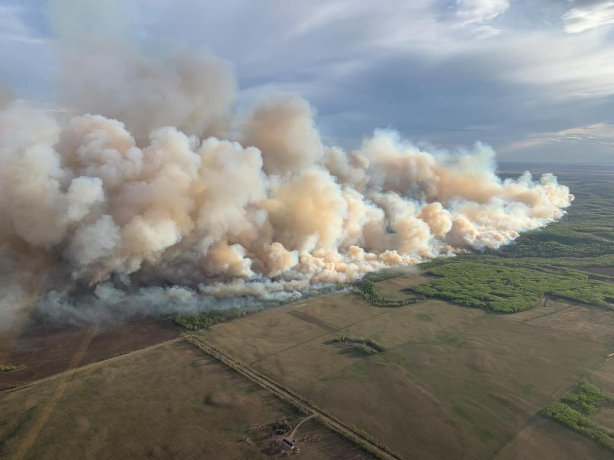 Some residents in County of Grande Prairie are being told to evacuate their homes due to the threat of a nearby wildfire.  (County of Grande Prairie - image credit)