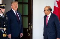 U.S. President Donald Trump welcomes Bahrain's Foreign Minister Abdullatif bin Rashid Al Zayani at the White House