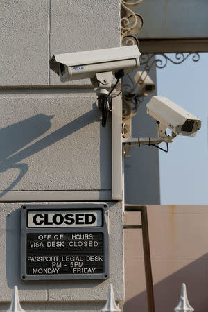 Surveillance cameras are seen above a closed sign outside the Consulate General of Russia in San Francisco, California, U.S., September 2, 2017. REUTERS/Stephen Lam