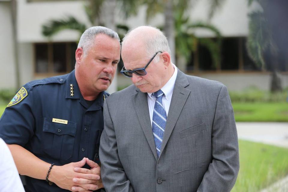 FIU police chief, Alexander Casas (left), with former FIU president, Mark Rosenberg, at a 2018 press conference.