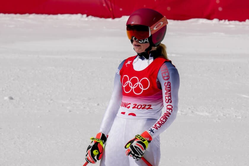 Mikaela Shiffrin, of the United States, after finishing the women's downhill at the 2022 Winter Olympics, Tuesday, Feb. 15, 2022, in the Yanqing district of Beijing. (AP Photo/Luca Bruno)