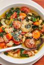 <p>A good, hearty <a href="https://www.delish.com/uk/cooking/recipes/g28794441/vegetable-soup/" rel="nofollow noopener" target="_blank" data-ylk="slk:soup;elm:context_link;itc:0;sec:content-canvas" class="link ">soup</a> is one of our favourite ways to warm up in the colder months. And this Slow Cooker Sausage and White Bean Soup will do that perfectly.</p><p>Get the <a href="https://www.delish.com/uk/cooking/recipes/a29794477/slow-cooker-sausage-and-white-bean-soup-recipe/" rel="nofollow noopener" target="_blank" data-ylk="slk:Slow Cooker Sausage and White Bean Soup;elm:context_link;itc:0;sec:content-canvas" class="link ">Slow Cooker Sausage and White Bean Soup</a> recipe.</p>