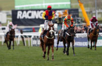 Horse Racing - Cheltenham Festival - Cheltenham Racecourse, Cheltenham, Britain - March 16, 2018 Native River ridden by Richard Johnson celebrates winning the 15.30 Timico Cheltenham Gold Cup Chase REUTERS/Darren Staples