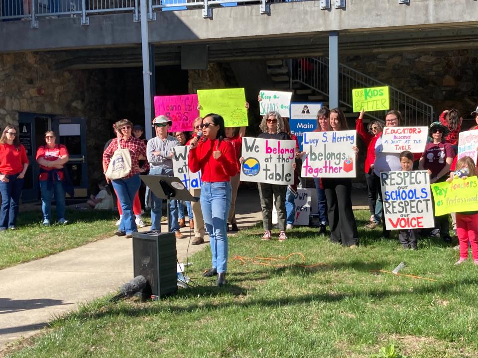 Yen Kilday, a Lucy S. Herring Elementary School parent and PTO member, stood in front of the administrative offices at Asheville City Schools, speaking to feelings of "powerlessness" as the district considered closure of Lucy Herring next year.