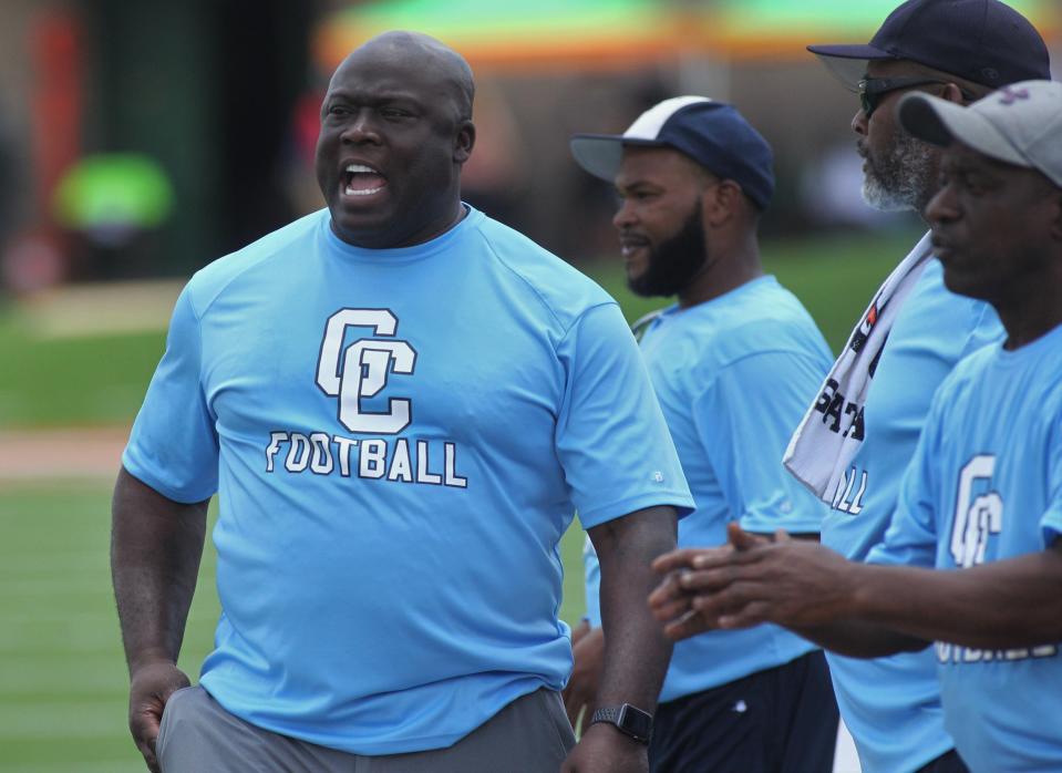 Gadsden County football coach Corey Fuller yells instructions to his team during the Big Bend Spring Football Classic at Bragg Memorial Stadium.