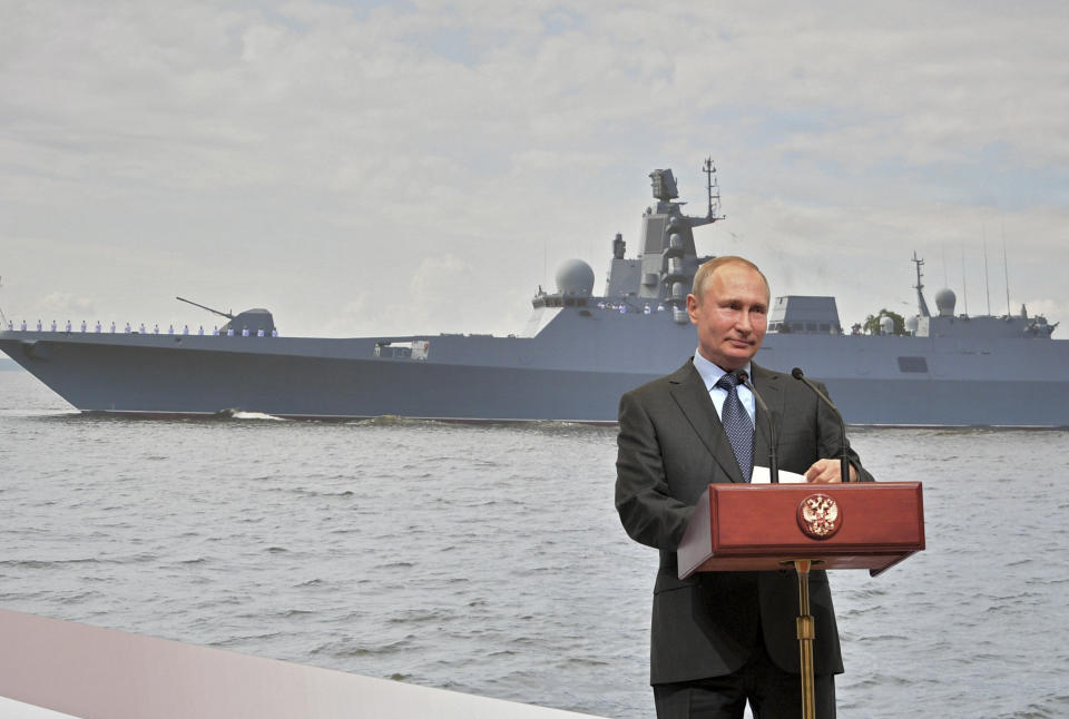 Russian President Vladimir Putin speaks during as he visits a shipyard in St. Petersburg, Russia, Tuesday, April 23, 2019. Putin said the government will pursue an ambitious navy modernization effort. (Alexei Druzhinin, Sputnik, Kremlin Pool Photo via AP)