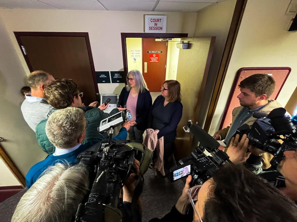 Adeline Hambley (left) and her lawyer Sarah Howard (right) speak with media Friday, March 31, 2023, at the Michigan 14th Circuit Court in Muskegon.