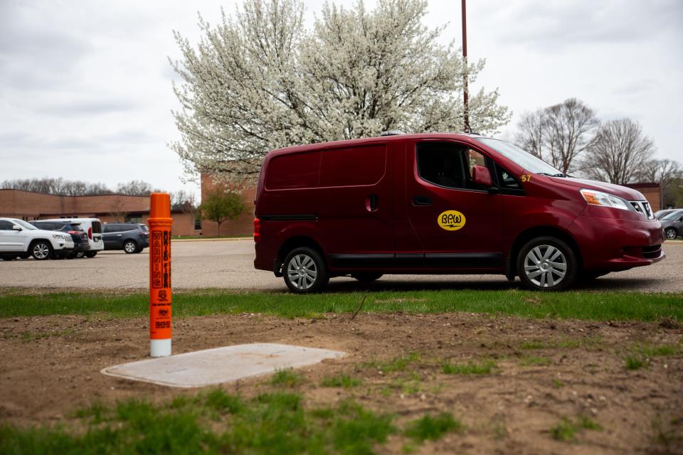 An electrical hand hole sits near a BPW van Thursday, May 5, 2022. The box houses newly installed fiber optic cable. 