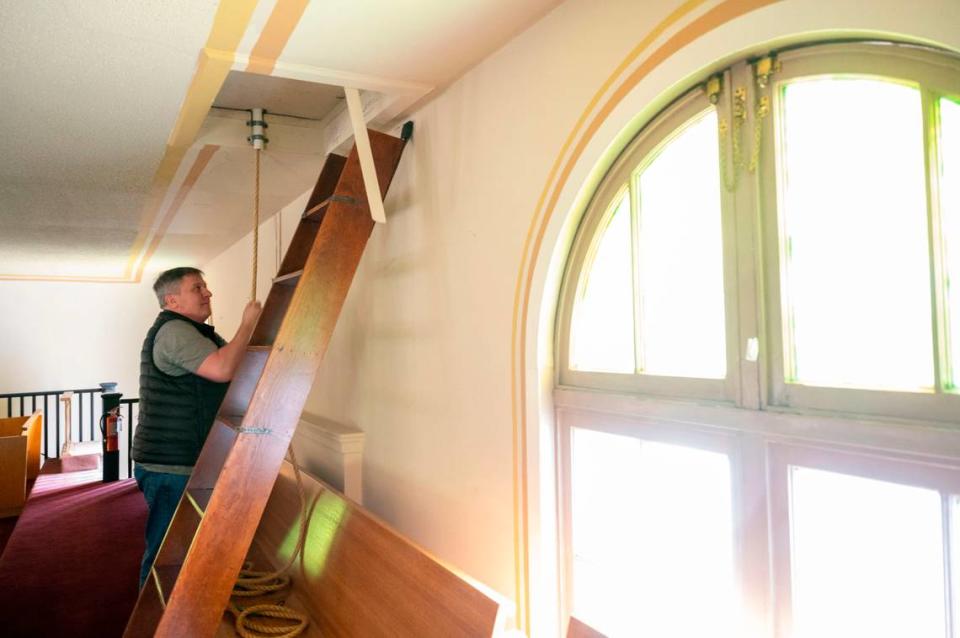 Dave Viafore rings the church bell honoring Father Ron Knudsen’s 50th anniversary of his ordination which was also coincidentally the final mass at St. Rita of Cascia on Wednesday, June 8, 2022, in Tacoma.
