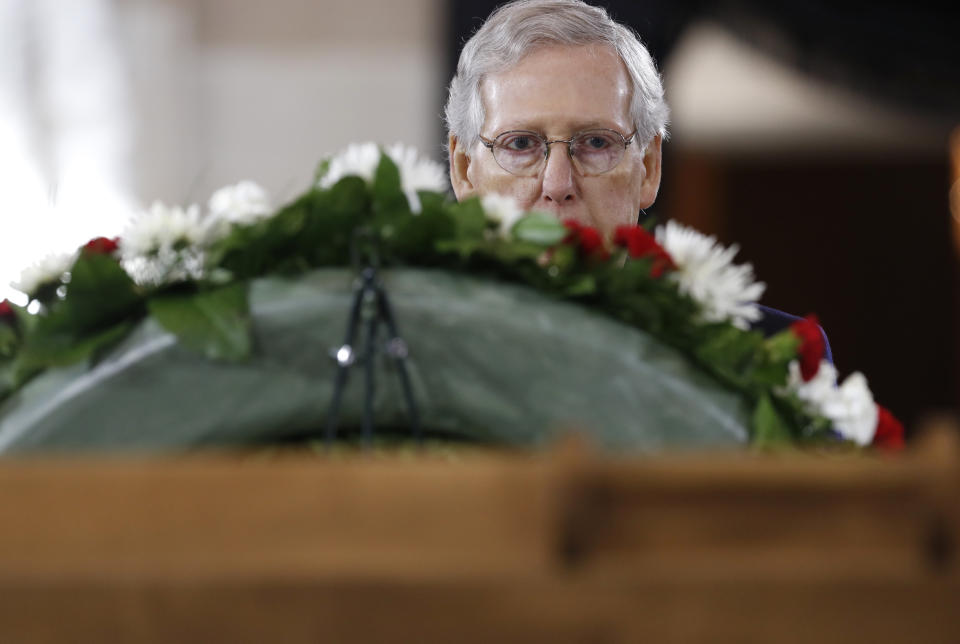 <p>Senate Majority Leader Mitch McConnell looks over the casket during ceremonies in the U.S. Capitol Rotunda as the remains of the late Rev. Billy Graham lie in honor in Washington, Feb. 28, 2018. (Photo: Jonathan Ernst/Reuters) </p>