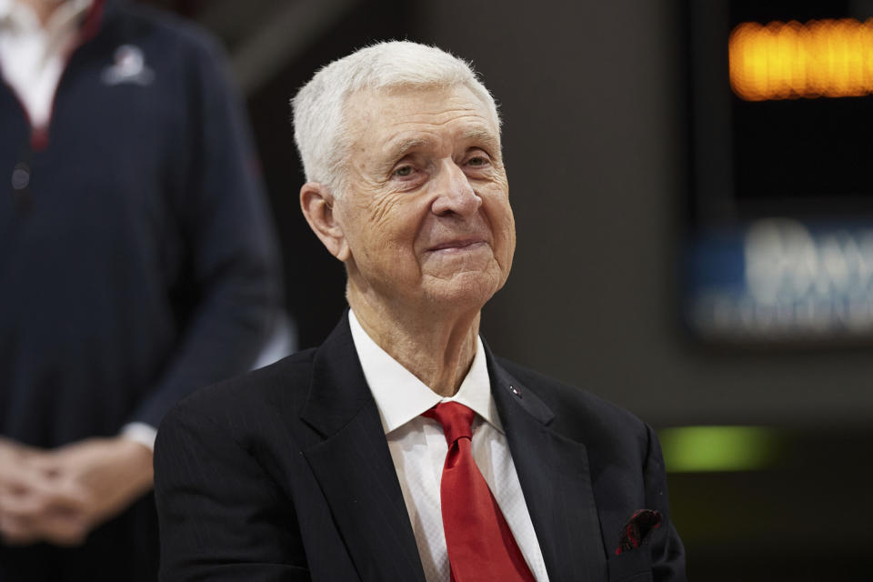 Former Davidson basketball player, coach, and Athletic Director Terry Holland smiles during a ceremony to retire his jersey number 42 following the NCAA college basketball game between LaSalle and Davidson on Sunday, Jan. 30, 2022, in Davidson, N.C. (AP Photo/Brian Westerholt)