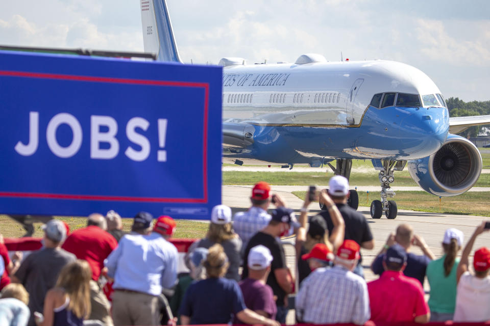 President Donald Trump arrives for an event at the Wittman Regional Airport Monday, Aug. 17, 2020, in Oshkosh, Wis. (AP Photo/Mike Roemer)