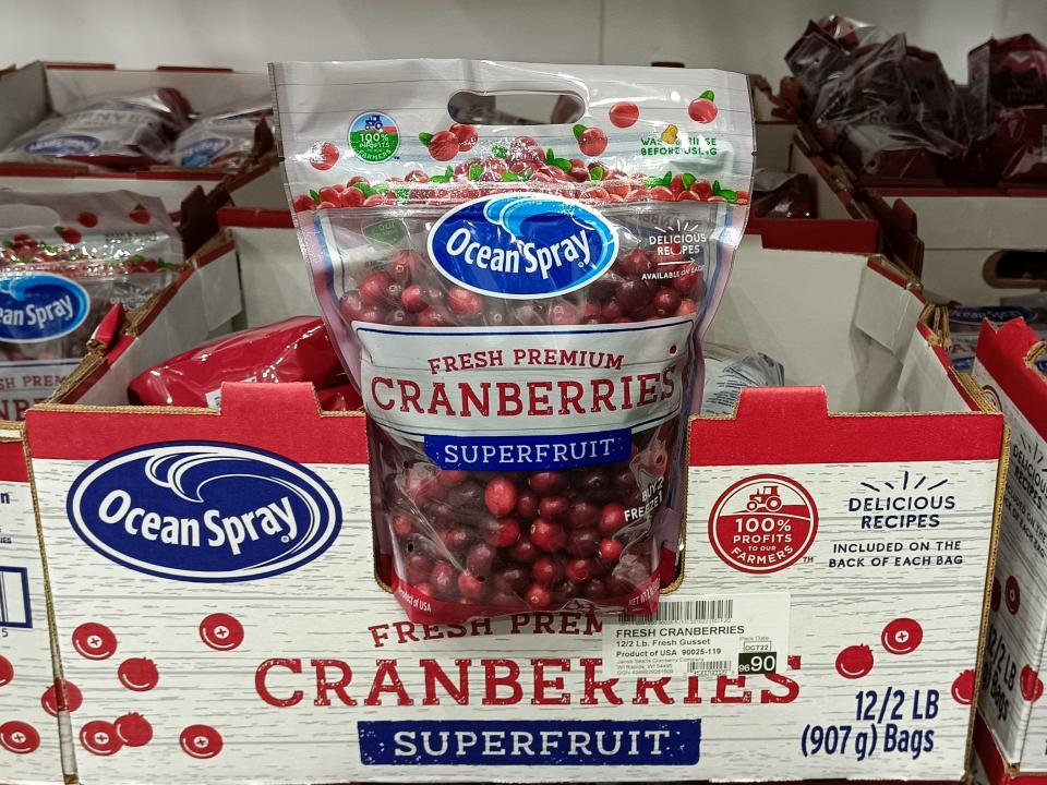 blue, white, and red boxes of bags of ocean spray cranberries at costco